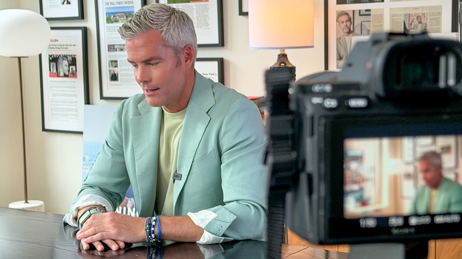 Ryan Serhant gives on-camera interview