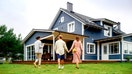 A real estate agent walks with a couple outside as they look at a home for sale. - Fox Business News
