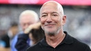 Jeff Bezos looks on before a game between the Washington Commanders and the Dallas Cowboys at AT&T Stadium on September 20, 2026. - Fox Business News