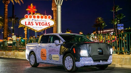 A preproduction Ford Fathom electric truck drives past the "Welcome to Fabulous Las Vegas" sign in Nevada. - Fox Business News