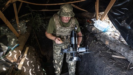 A Ukrainian soldier carries a drone to attack enemy drones in the Donetsk region of Ukraine on Oct. 8, 2026. - Fox Business News