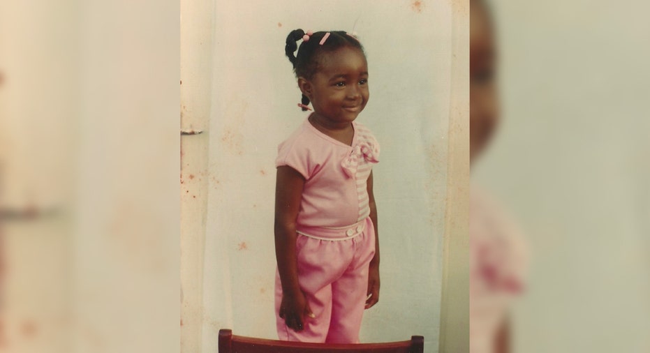 Patrice Onwuka childhood photo on chair