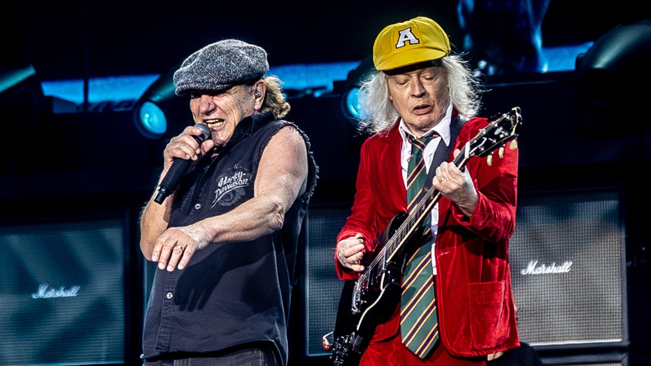 Brian Johnson and Angus Young