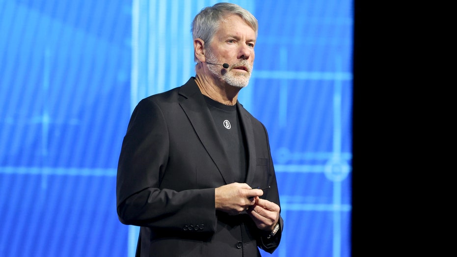 Michael Saylor speaks on stage.