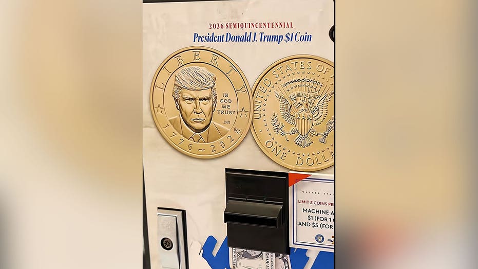 Dollar coin exchange machine displaying both sides of the 2026 Trump coin, featuring his portrait and the Presidential Seal