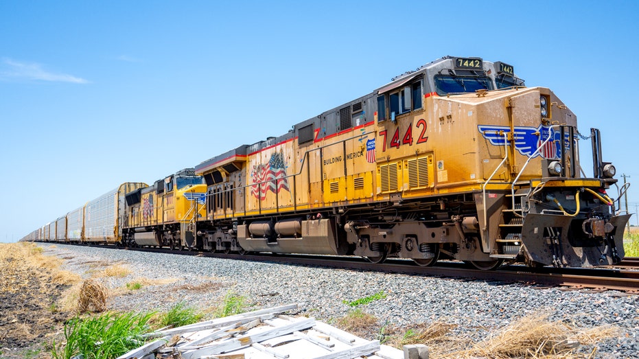A Union Pacific train on tracks.