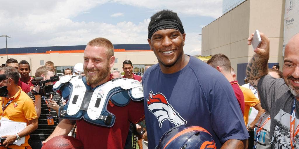 Denver Broncos tight end Julius Thomas (80) breaks up field after