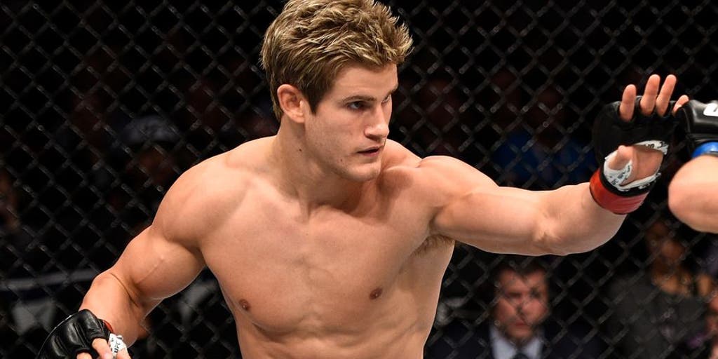 Р‘РѕРµС† UFC РјРѕР»РѕРґРѕР№ Р±Р»РѕРЅРґРёРЅ