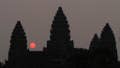 In this Friday, March 20, 2015, file photo, the sun rises behind Angkor Wat at the eastern site of Siem Reap province, some 143 miles northwest of Phnom Penh, Cambodia.