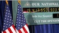 Feb. 24, 2012: A national debt clock is shown during a campaign event for Mitt Romney in Kalamazoo, Mich. - Fox News