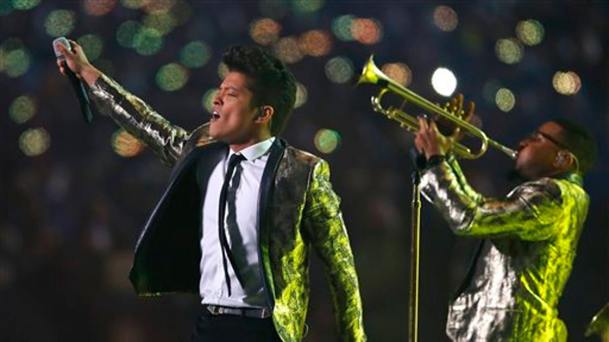 Bruno Mars performs during the halftime show of the NFL Super Bowl XLVIII football game Sunday, Feb. 2, 2014, in East Rutherford, N.J. (AP Photo/Paul Sancya) 