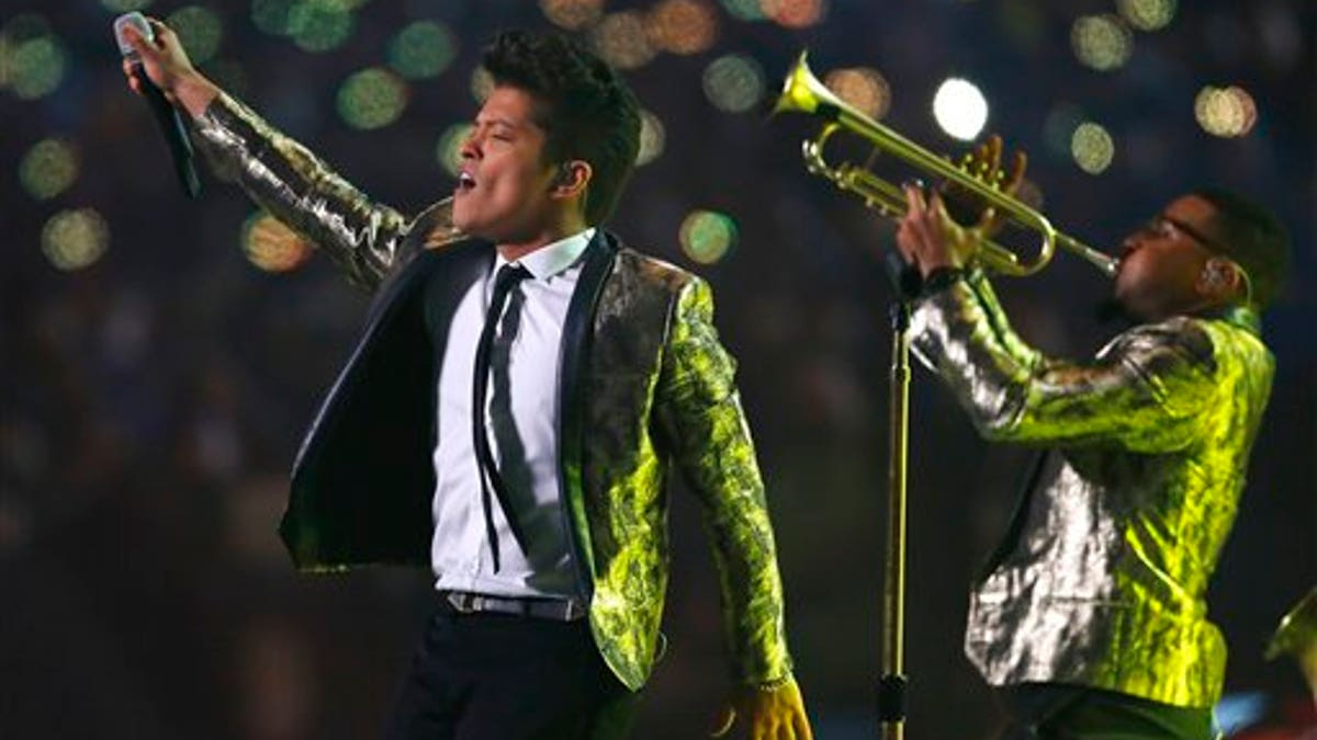 Bruno Mars performs during the halftime show of the NFL Super Bowl XLVIII football game Sunday, Feb. 2, 2014, in East Rutherford, N.J. (AP Photo/Paul Sancya) 