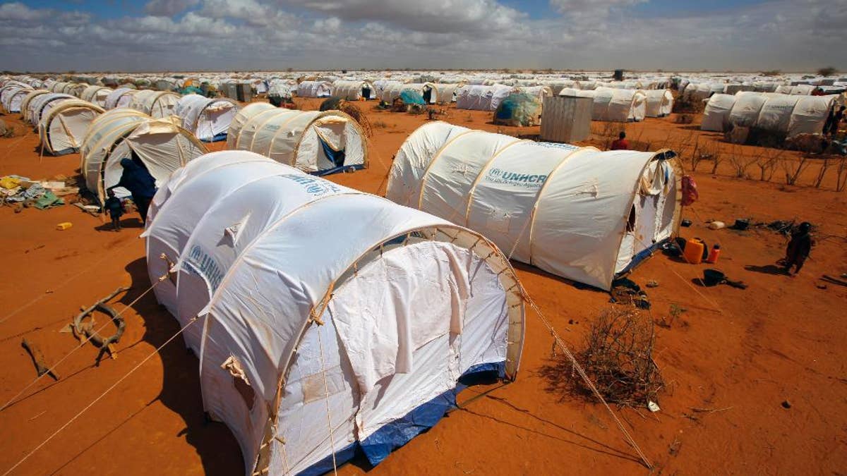 FILE - In this Friday, Aug. 5, 2011, file photo, tents are seen at the UNHCR's Ifo Extension camp outside Dadaab, eastern Kenya, 100 kilometers (62 miles) from the Somali border. A Kenyan court on Thursday, Feb. 9, 2017 declared illegal a government order to close the world's largest refugee camp and send more than 200,000 people back to war-torn Somalia. (AP Photo/Jerome Delay, File)