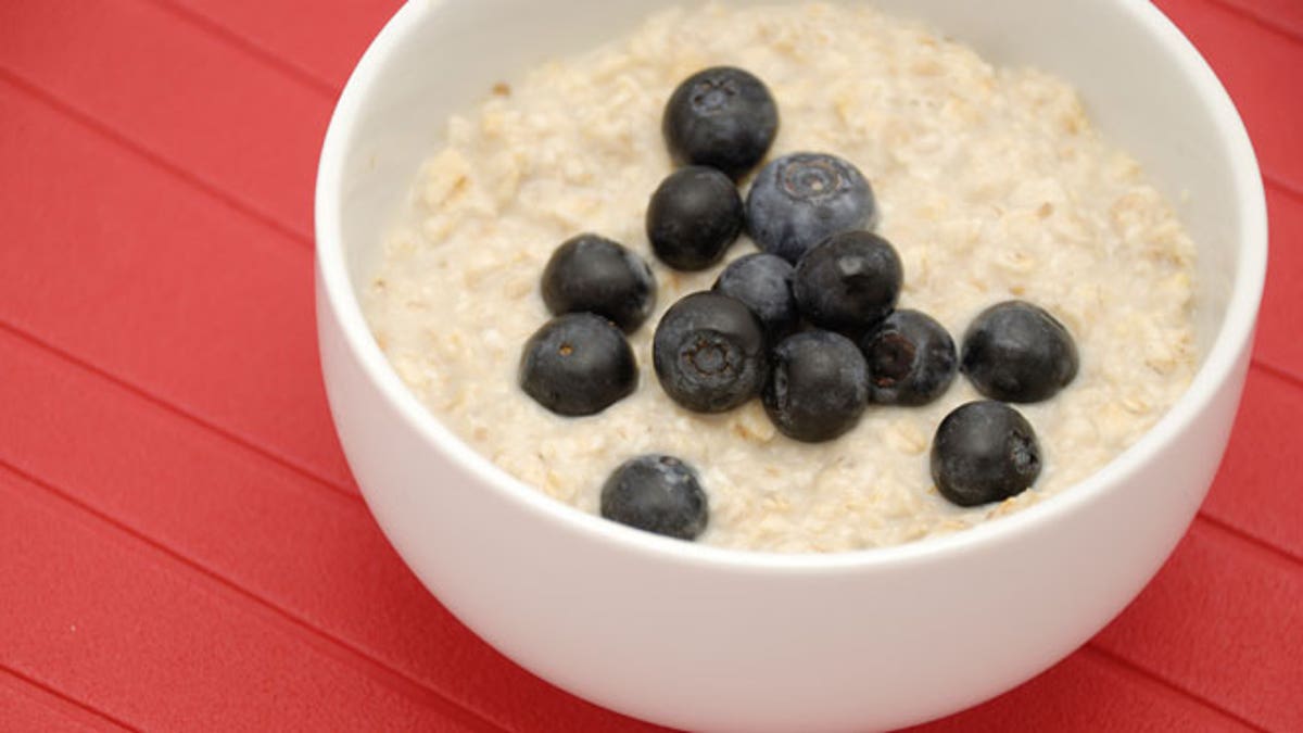 011ccfea-Blueberries and oatmeal in white bowl