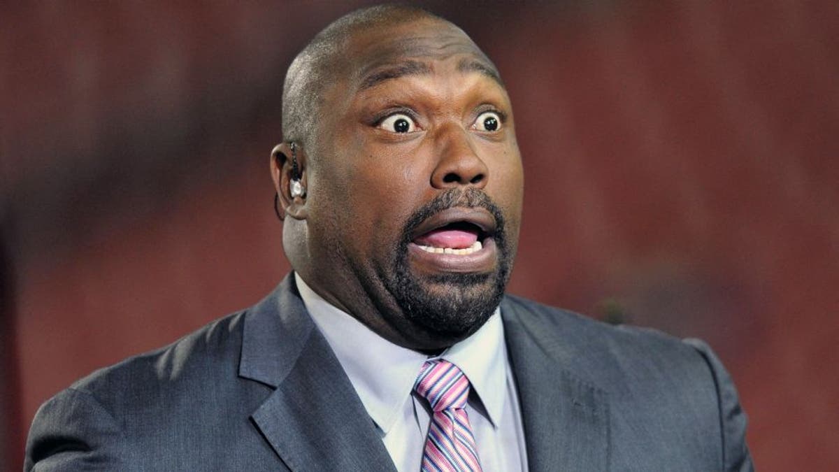 Oct 24, 2013; Tampa, FL, USA; NFL former player Warren Sapp reacts on stage before a game between the Carolina Panthers and the Tampa Bay Buccaneers at Raymond James Stadium. Mandatory Credit: Steve Mitchell-USA TODAY Sports