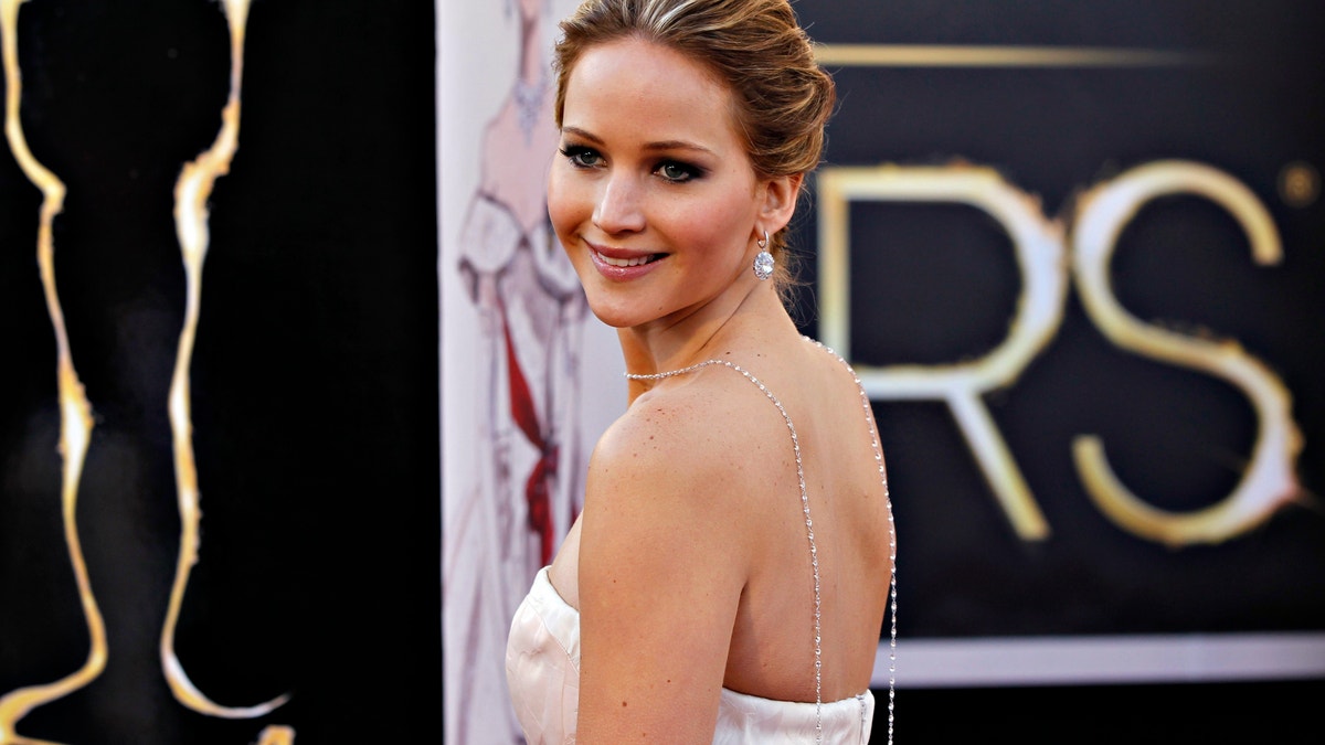 Jennifer Lawrence arrives at the 85th annual Academy Awards. 