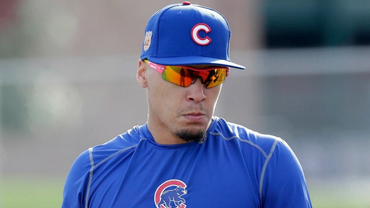 Cubs 2B Javier Baez shows off his magnificent new World Series