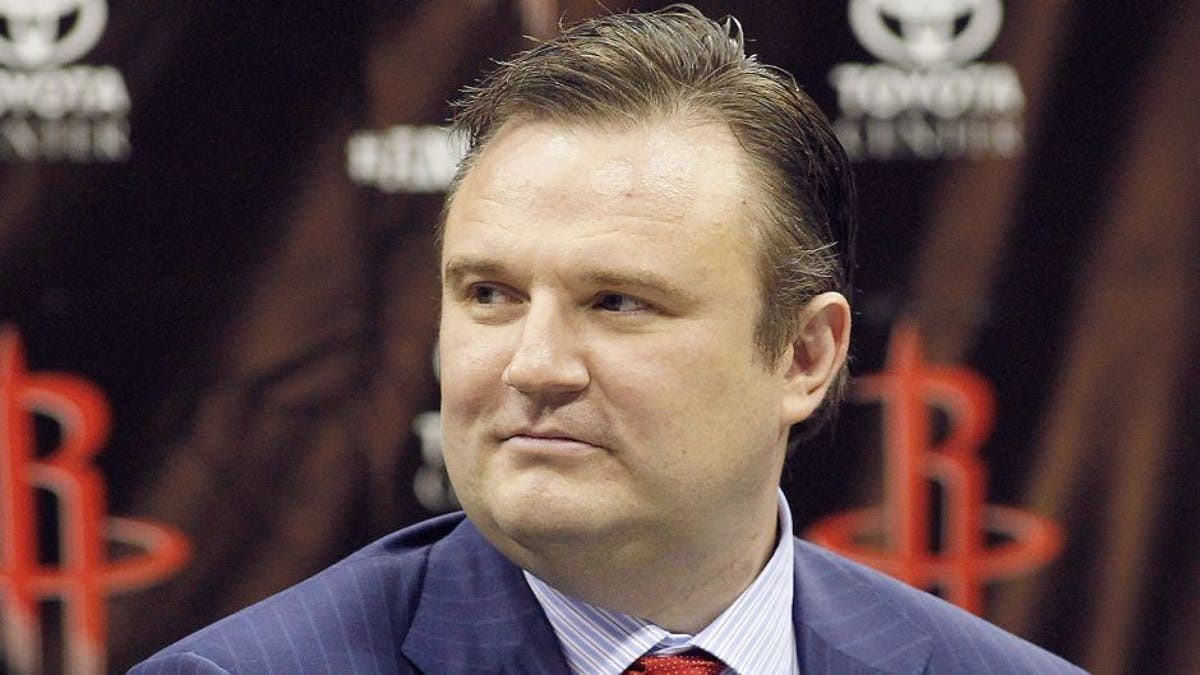 HOUSTON, TX - JULY 13: Houston Rockets general manager Daryl Morey listens as Dwight Howard is officially introduced as a Houston Rocket during a press conference on July 13, 2013 in Houston, Texas. (Photo by Bob Levey/Getty Images)