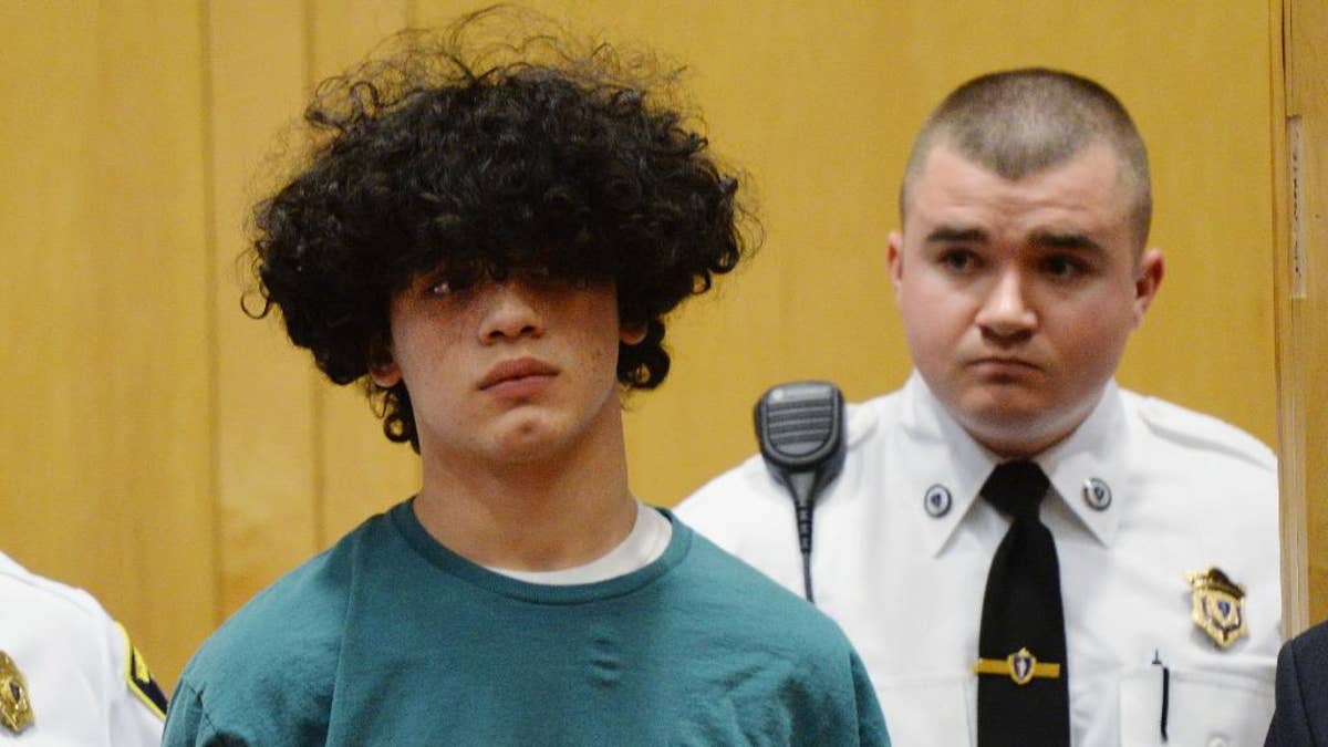 Mathew Borges, 15, attends his arraignment in Lawrence District Court in Lawrence, Mass, Monday, Dec. 5, 2016. Borges was held without bail after pleading not guilty at the brief arraignment Monday on a first-degree murder charge. (Paul Bilodeau/The Eagle-Tribune via AP, Pool)