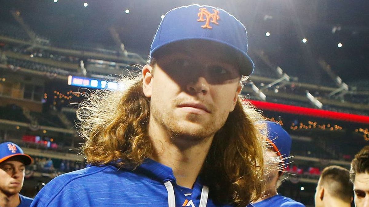 Mets place Jacob deGrom on family medical emergency list, related