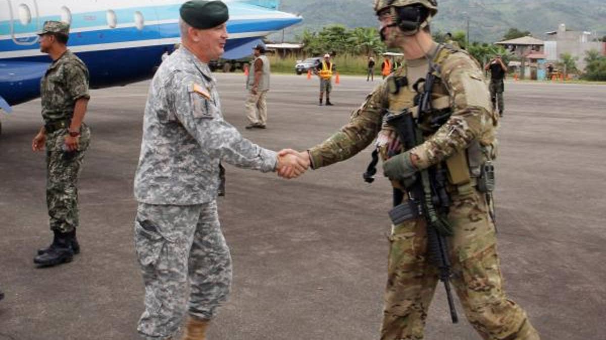 (Left) Army Brig. Gen. Sean P. Mulholland, the commander of Special Operations Command South, greets U.S. servicemembers May 7 to Lima, Peru. During his visit to the region, Mulholland spoke with Peruvian military commanders to discuss a range of topics including military collaboration, improving regional security as well as observing an ongoing U.S.-Peruvian military exercise. As the special operations component for U.S. Southern Command (USSOUTHCOM), SOCSOUTH, headquartered at Homestead Air Reserve Base, Fla., assists special operations partners across Central and South America and the Caribbean to build its military capacity. (Department of Defense photo by Army Maj. Emanuel Ortiz, Special Operations Command South Public Affairs Office)