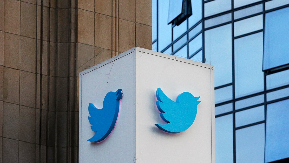 This Wednesday, Oct. 26, 2016, photo shows a Twitter sign outside of the company's headquarters in San Francisco. Twitter will be enforcing stricter policies on violent and abusive content such as hateful images or symbols, including those attached to user profiles, the company announced Monday, Dec. 18, 2017. (AP Photo/Jeff Chiu)