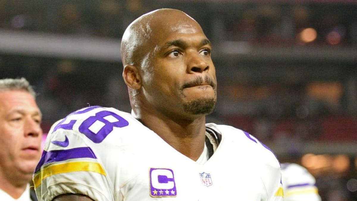 Dec 10, 2015; Glendale, AZ, USA; Minnesota Vikings running back Adrian Peterson (28) looks on after leasing 23-20 to the Arizona Cardinals at University of Phoenix Stadium. Mandatory Credit: Matt Kartozian-USA TODAY Sports