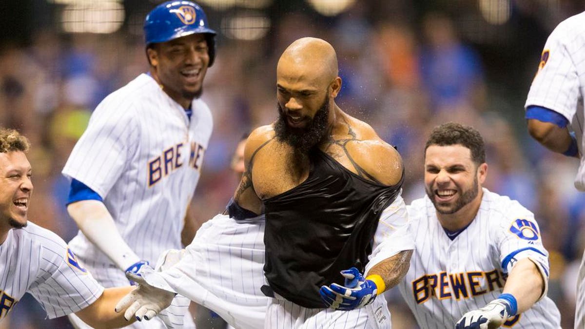 Eric Thames hit his career's 1st Walkoff homer which led to his jersey  being ripped off during the celebration.