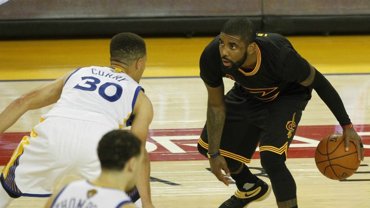 Watch Kyrie Irving hit the 3 over Stephen Curry that clinched the Cavaliers title Fox News