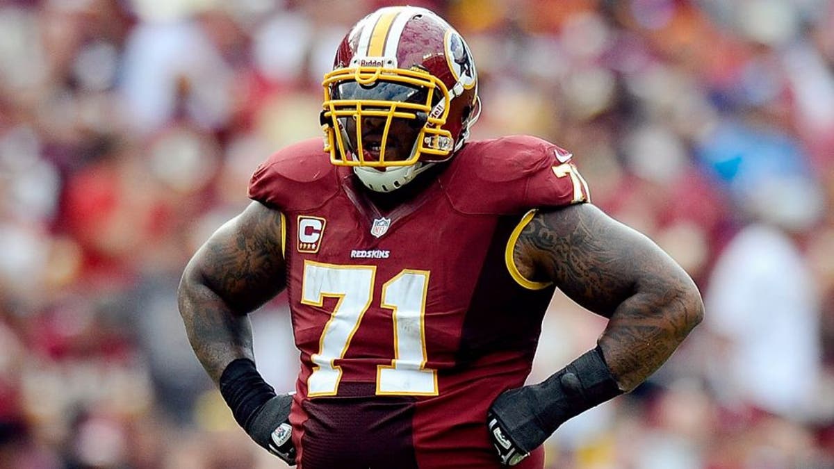 LANDOVER, MD - SEPTEMBER 22: Trent Williams #71 of the Washington Redskins reacts after a play in the fourth quarter during a game against the Detroit Lions at FedExField on September 22, 2013 in Landover, Maryland. (Photo by Patrick McDermott/Getty Images)