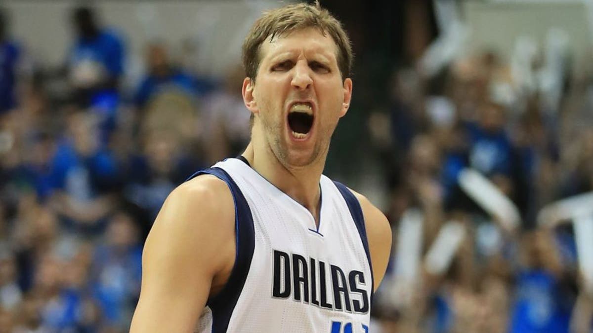 DALLAS, TX - APRIL 21: Dirk Nowitzki #41 of the Dallas Mavericks reacts against the Oklahoma City Thunder during game three of the Western Conference Quarterfinals of the 2016 NBA Playoffs at American Airlines Center on April 21, 2016 in Dallas, Texas. NOTE TO USER: User expressly acknowledges and agrees that, by downloading and or using this photograph, User is consenting to the terms and conditions of the Getty Images License Agreement. (Photo by Ronald Martinez/Getty Images)