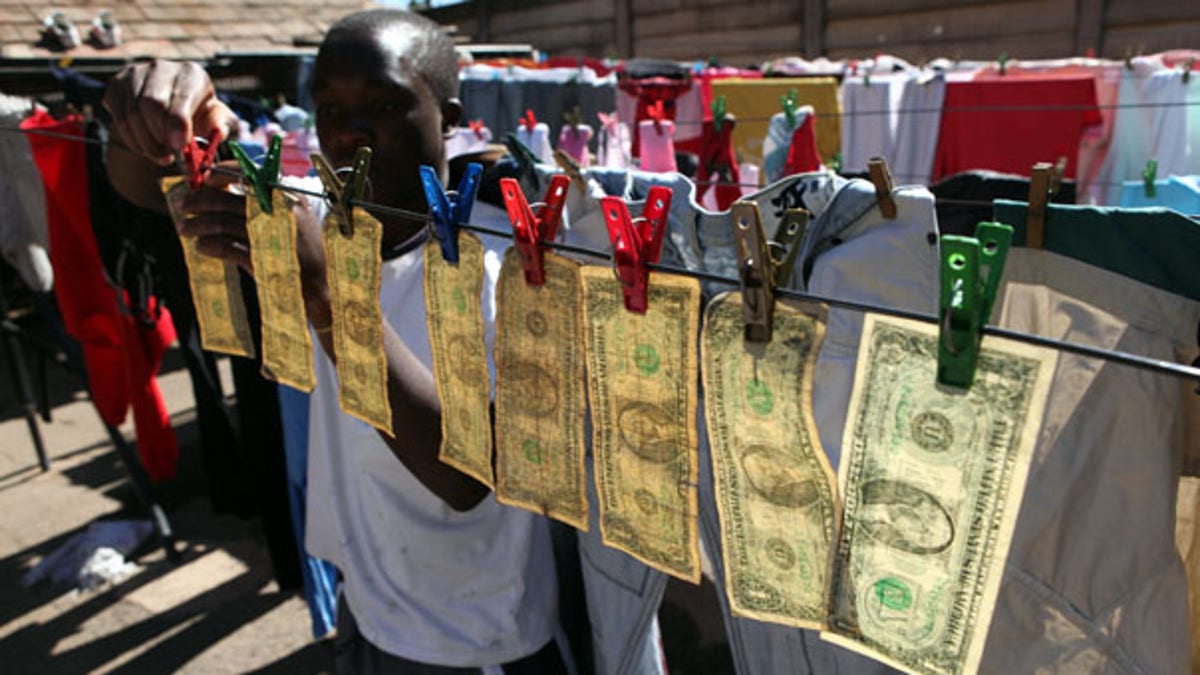 APTOPIX Zimbabwe Money Laundering