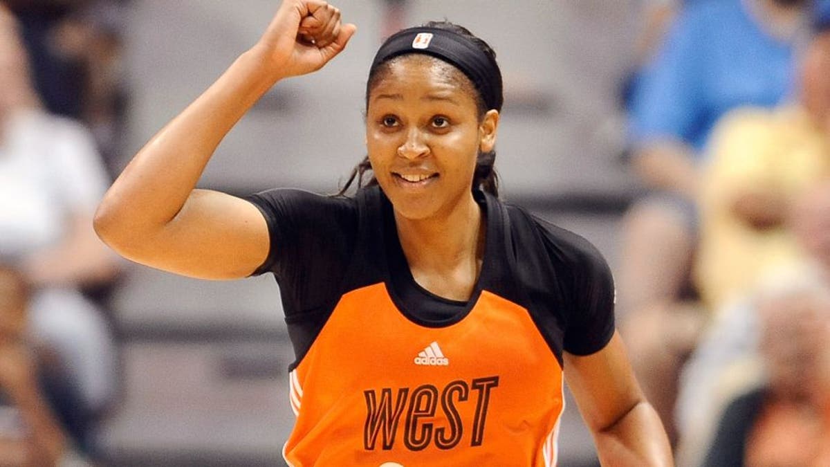 Westâs Maya Moore, of the Minnesota Lynx, reacts in the final seconds the WNBA All-Star basketball game, Saturday, July 25, 2015, in Uncasville, Conn. West won 117-112. Moore was the game's MVP. (AP Photo/Jessica Hill)