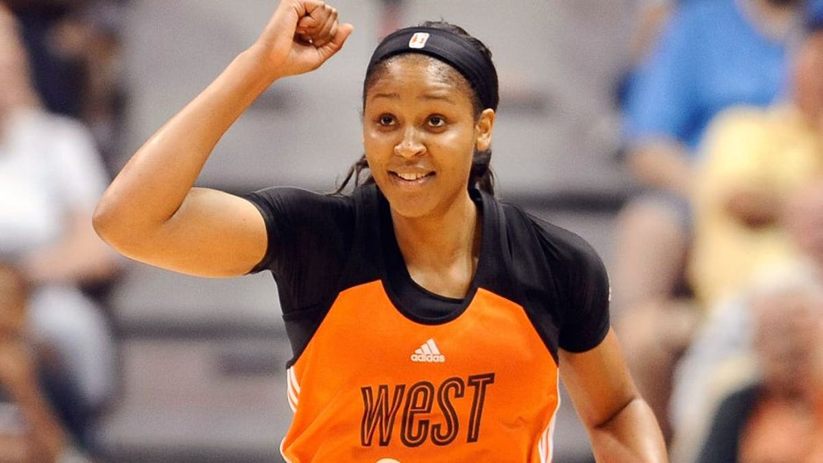 Westâs Maya Moore, of the Minnesota Lynx, reacts in the final seconds the WNBA All-Star basketball game, Saturday, July 25, 2015, in Uncasville, Conn. West won 117-112. Moore was the game's MVP. (AP Photo/Jessica Hill)