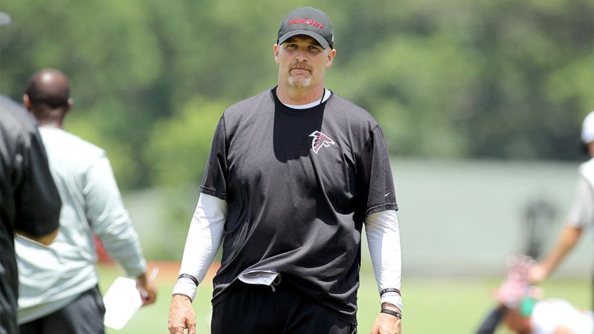 Jun 17, 2015; Atlanta, GA, USA; Atlanta Falcons head coach Dan Quinn coaches during minicamp at Falcons Training Facility. Mandatory Credit: Brett Davis-USA TODAY Sports