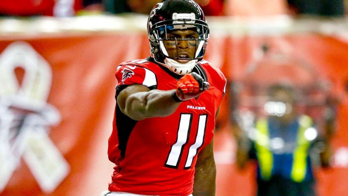 ATLANTA, GA - NOVEMBER 23: Julio Jones #11 of the Atlanta Falcons celebraes a touchdown in the first half against the Cleveland Browns at Georgia Dome on November 23, 2014 in Atlanta, Georgia. (Photo by Kevin C. Cox/Getty Images)