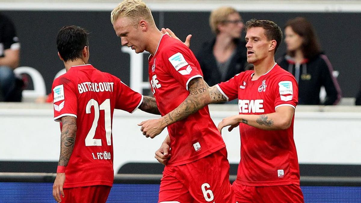 Köln menghukum Stuttgart untuk mengambil tiga poin di awal Bundesliga