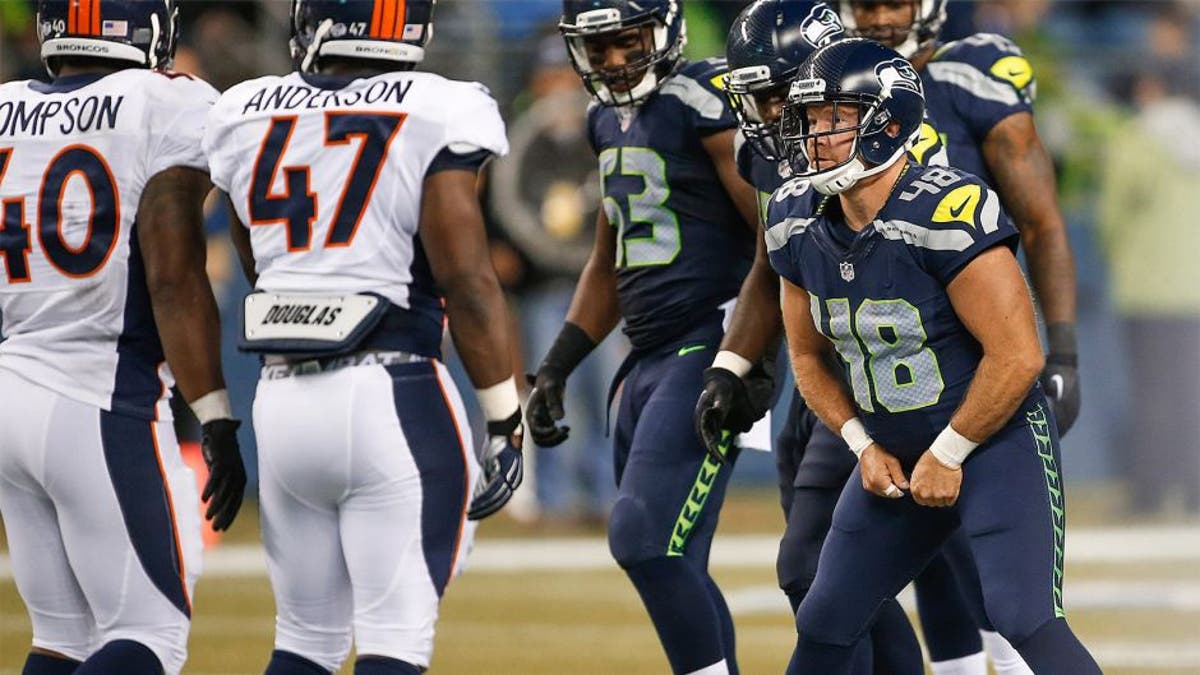 Aug 14, 2015; Seattle, WA, USA; Seattle Seahawks long snapper Nate Boyer (48) readies himself for a play against the Denver Broncos during the fourth quarter in a preseason NFL football game at CenturyLink Field. Mandatory Credit: Joe Nicholson-USA TODAY Sports