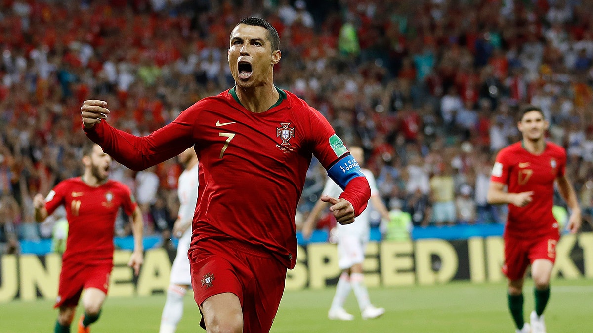 Portugal's Cristiano Ronaldo celebrates his side's opening goal during the group B match between Portugal and Spain at the 2018 soccer World Cup in the Fisht Stadium in Sochi, Russia, Friday, June 15, 2018. (AP Photo/Francisco Seco)