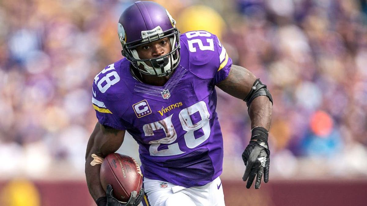 Sep 20, 2015; Minneapolis, MN, USA; Minnesota Vikings running back Adrian Peterson (28) rushes with the ball in the second half against the Detroit Lions at TCF Bank Stadium. The Vikings won 26-16. Mandatory Credit: Jesse Johnson-USA TODAY Sports