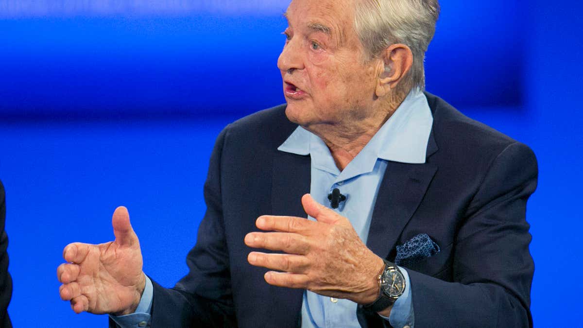 George Soros, chairman of Soros Fund Management, talks during a television interview for CNN at the Clinton Global Initiative in New York.