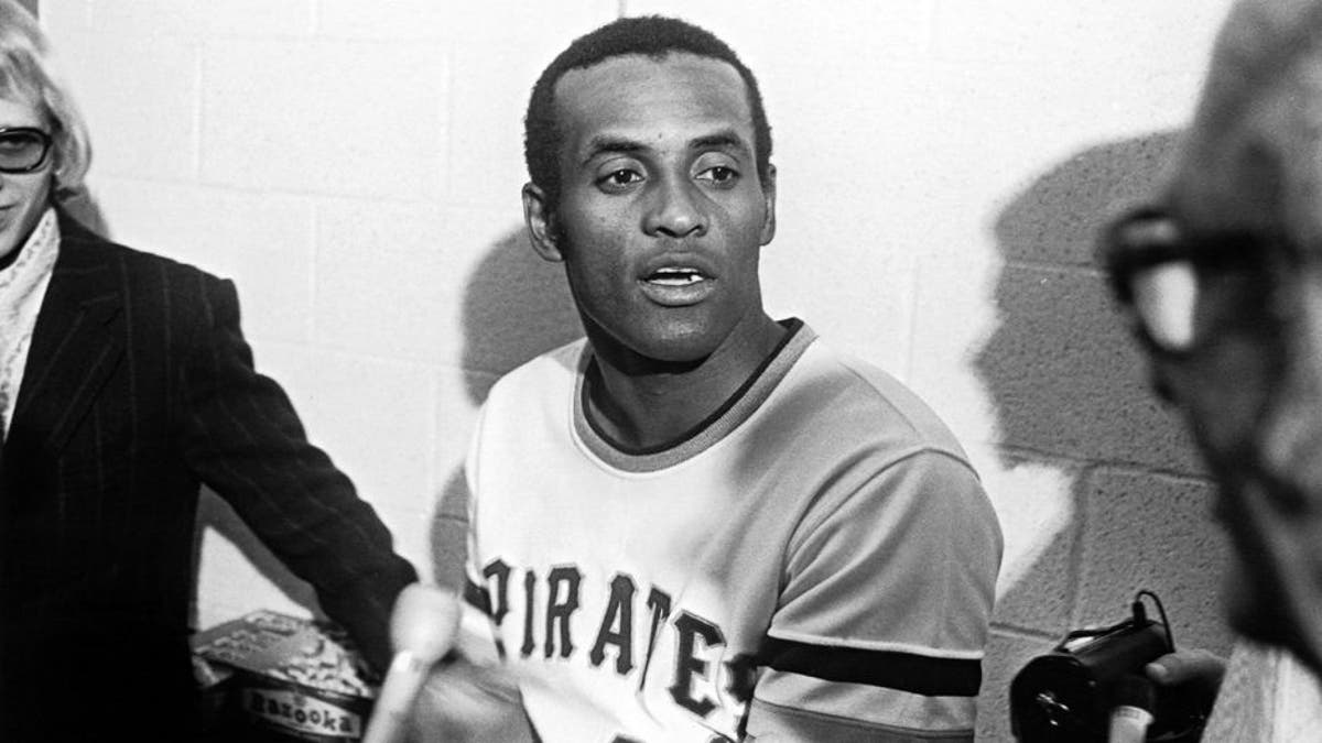 PITTSBURGH - Roberto Clemente #21 of the Pittsburgh Pirates talks to the media after getting his 3000th hit against the New York Mets at Three Rivers Stadium on September 30, 1972 in Pittsburgh, Pennsylvania. (Photo by: Morris Berman/MLB Photos via Getty Images)