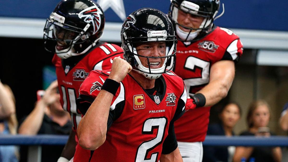 Atlanta Falcons' Matt Ryan celebrates after a touchdown during the