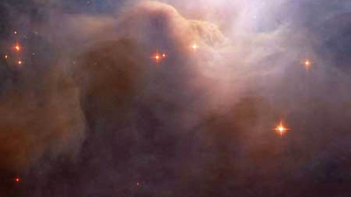 Hubble Photographs Billowing Clouds of Cosmic Dust