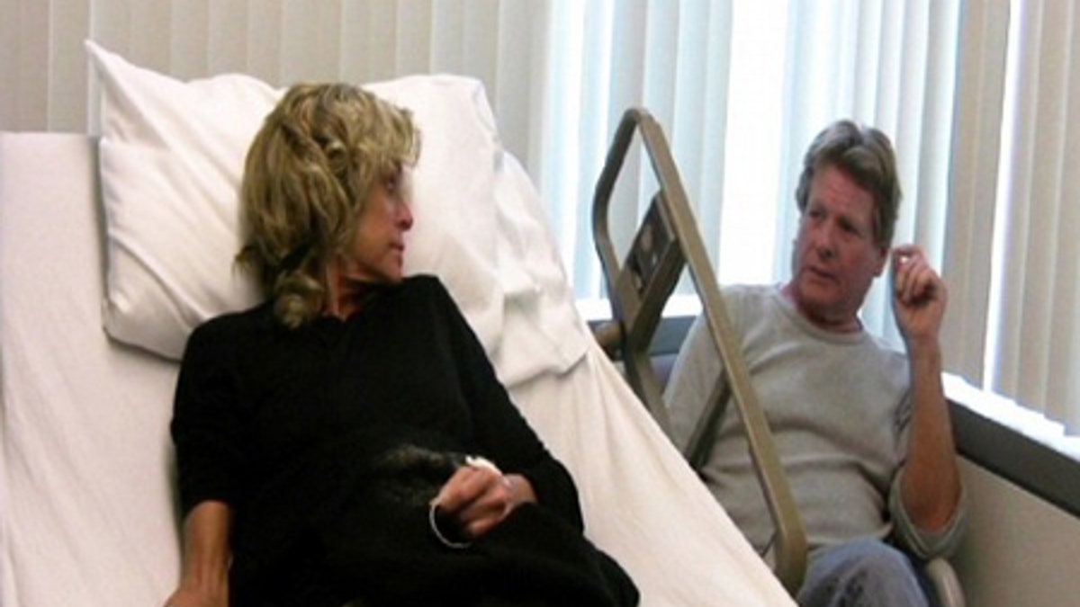 Farrah Fawcett and Ryan O'Neal are shown in this publicity photo from the video diary 'Farrah's Story.'