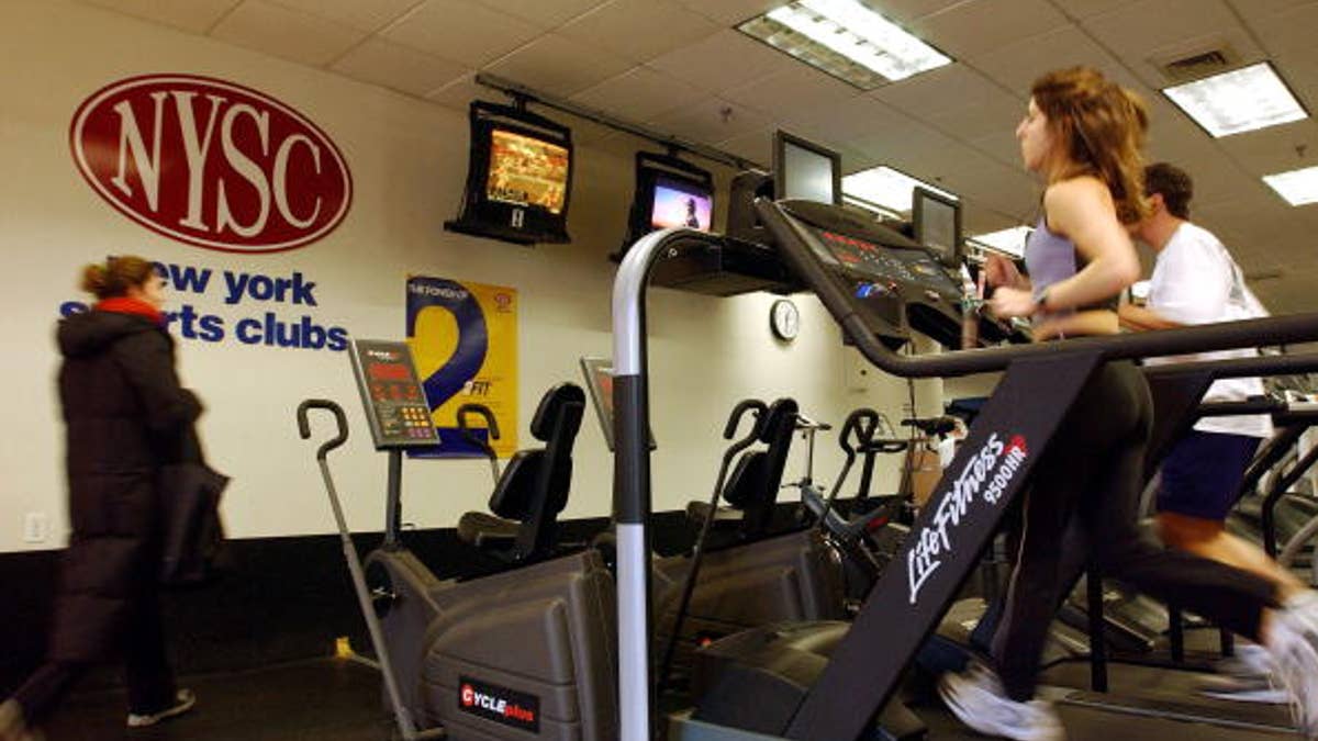 BROOKLYN, NEW YORK - JANUARY 2: People run on treadmills at a New York Sports Club January 2, 2003 in Brooklyn, New York. Thousands of people around the country join health clubs in the first week of the new year as part of their New Year's resolution. Many health clubs see a surge in business of 25 percent immediately after the new year, only to see those numbers level off by spring. (Photo by Spencer Platt/Getty Images)