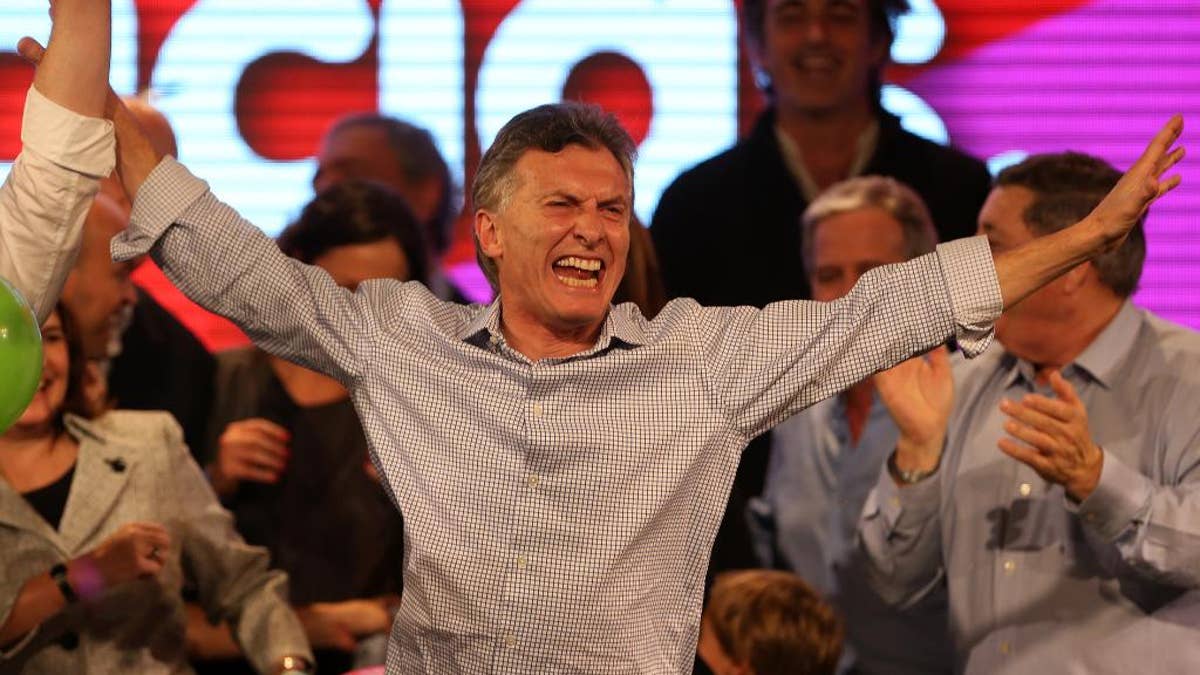 Surrounded by supporters, the current Mayor of Buenos Aires and presidential candidate Mauricio Macri celebrates at the end of mayoral <a href='https://articlebizindia.in/author/articlebizindia-in' target='_blank'>elections</a> in Buenos Aires, Argentina, Sunday, July 5, 2015. Buenos Aires will have a runoff election that would have the current Cabinet Chief of Buenos Aires and mayoral candidate Horacio Rodriguez Larreta competing against Martín Lousteau, candidate of the ECO coalition. (AP Photo/Daniel Jayo)” width=”1200″ height=”675″/></source></source></source></source></picture></div>
<div class=