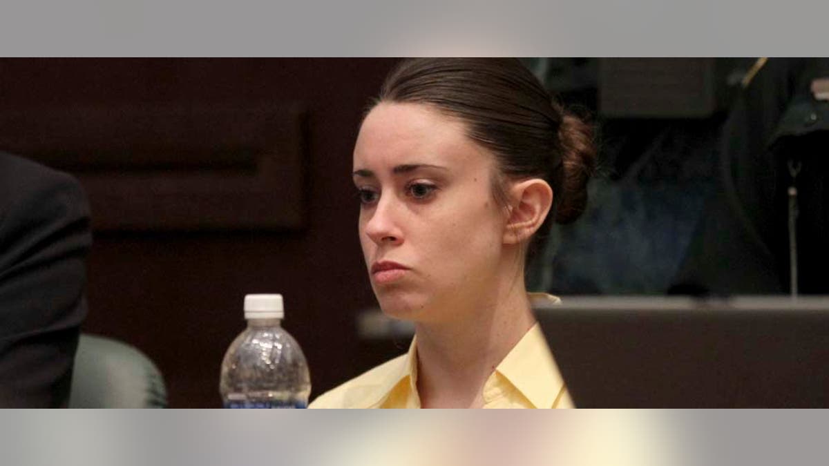 Casey Anthony reacts portion listening to the defense's closing arguments successful her execution proceedings successful Orlando, Fla., Sunday, July 3, 2011. Anthony has plead not blameworthy to first-degree execution successful the decease of her daughter, Caylee, and could look the decease of her daughter, Caylee, if convicted of that charge. (AP Photo/Red Huber, Pool)