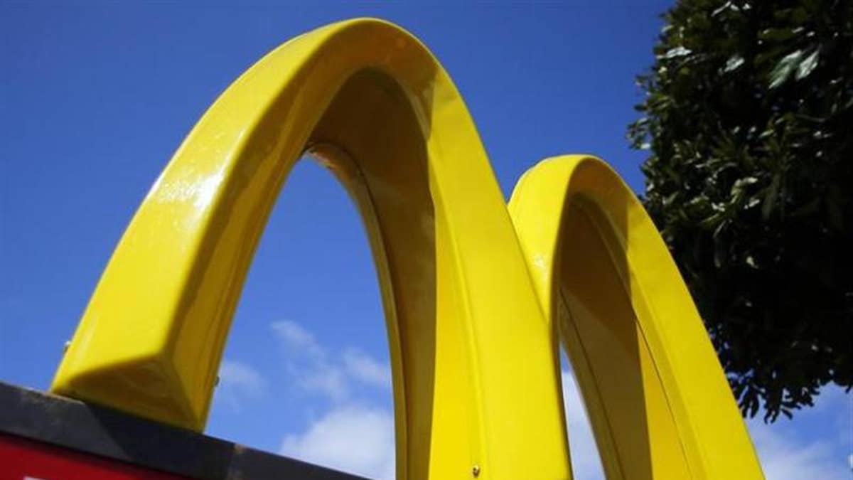 A McDonald's restaurant sign is seen at a McDonald's restaurant in Del Mar, California April 16, 2013. REUTERS/Mike Blake