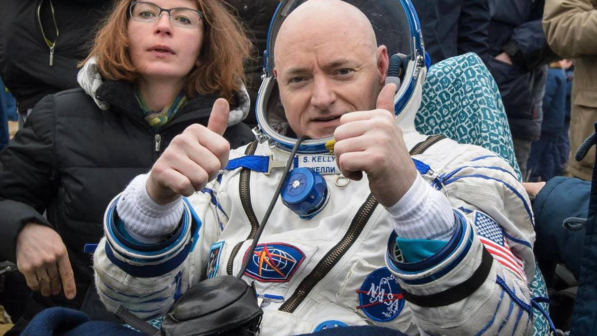 FILE - In this Wednesday, March 2, 2016, file photo provided by NASA, International Space Station (ISS) crew member Scott Kelly of the U.S. reacts after landing near the town of Dzhezkazgan, Kazakhstan. Kelly is exploring lots of options for the next step in his life. But he’s saving the serious job discussions for retirement, coming up April 1. (Bill Ingalls/NASA via AP, File)